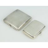 Two Edwardian silver cigarette cases Birmingham 1907 and 1908, 252 grams