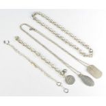 A silver bracelet and 3 silver necklaces 150 grams