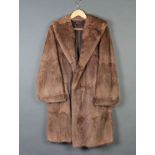 A lady's full length light mink fur coat