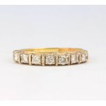 An 18ct yellow gold diamond ring size O