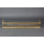 A Victorian pierced brass fender 23cm h x 140cm w x 36cm d