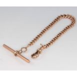 A 9ct yellow gold curb link bracelet with T bar and clasp, 21cm, 16.8 grams