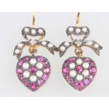 A pair of Edwardian style silver gilt ruby, diamond and pearl heart shaped earrings