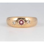 A 9ct yellow gold ruby and diamond ring size P