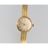 A lady's 18ct yellow gold Ebel watch on a ditto bracelet This watch winds, runs and is currently
