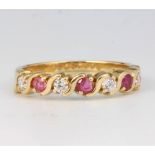 A 9ct yellow gold paste set ring size Q