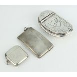 An Edwardian silver vesta Birmingham 1904, a card case and a tobacco box, 162 grams