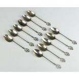 A set of 11 Art Nouveau silver teaspoons with pierced handles Birmingham 1932, 110 grams