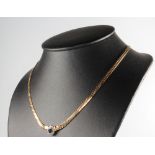 A 14ct yellow gold sapphire and diamond necklace 104 grams