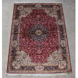 A red and gold ground Kashan style Belgian cotton rug 230cm x 160cm