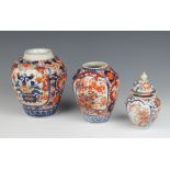 An Imari baluster vase and cover decorated with flowers 16cm, 2 bulbous ditto 18cm and 20cm The