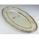 A Continental 800 standard oval platter with acanthus decoration 1180 grams