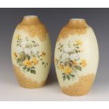 A pair of Victorian opalescent glass oviform vases decorated with flowers and scroll decoration 26cm