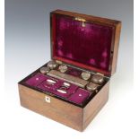 A Victorian mahogany work box with base drawer, containing glass jars with silver plated mounts