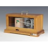 A mid 20th Century Veb Feingeratebau Drebach/Erzg.GDR barograph contained in a teak case