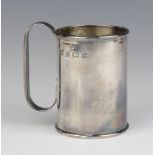 A silver mug of plain form Birmingham 1979, 9cm 212 grams