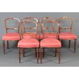A set of 6 Victorian bleached walnut hoop back dining chairs with carved mid rails and over