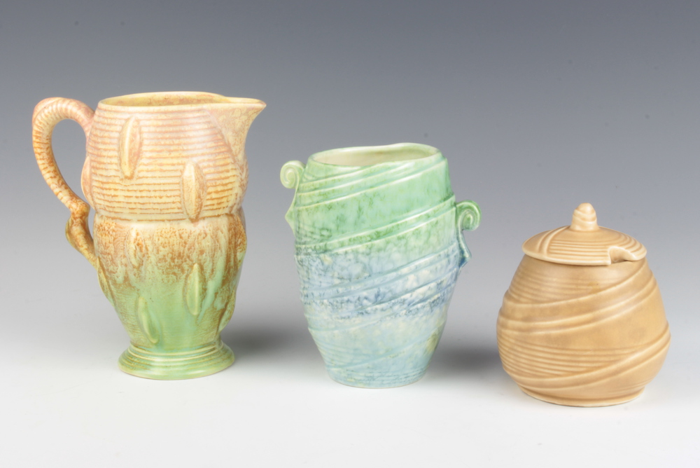 A Sylvac beige preserve pot 1365 11cm, a ditto vase 684 12cm and a jug 16cm