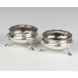 A pair of Edwardian silver table salts with hoof feet, Chester 1901, 6cm, 111 grams