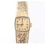 A lady's 9ct yellow gold Omega mechanical wristwatch on a ditto bracelet 18.2 gramsThe bracelet