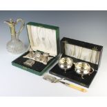 A Victorian silver plated mounted ewer, a cased jug and bowl and 4 plated cigarette lighters