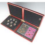 A cased double proof coin set and a ditto enamelled decimal and pre-decimal coin set