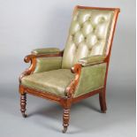 A Regency mahogany show frame library chair, the seat and back upholstered in green leather Slight