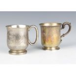 A Victorian silver mug with chased floral decoration London 1860, 7cm, a baluster ditto Sheffield