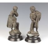 A pair of 19th Century spelter figures of standing fisher boy and girl 20cm h, with associated socle