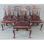 A set of 7 19th Century Irish Chippendale dining chairs with vase shaped slat backs and
