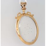 A 9ct yellow gold oval double sided locket 54cm