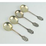 Four Continental 830 standard spoons with fancy floral handles 140 grams