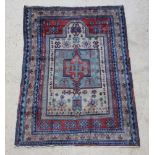 A brown, blue and white ground Caucasian prayer rug 136cm x 97cm (in-wear)