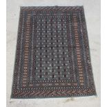 A green ground Bokhara rug with numerous diamonds to the centre within a multi row border 182cm x