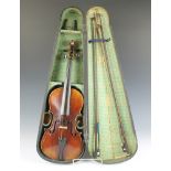 A 19th Century violin with 35cm 2 piece back, bearing label Joseph Guarnerius Fecit Cremonae Anno 17
