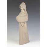 A Lladro matt figure of a standing monk 33cm