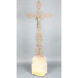 A 19th Century French cast iron crucifix raised on a carved stone base 189cm h x 74cm w