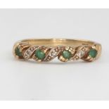 A 9ct yellow gold diamond and emerald set ring size L 1.7 grams gross