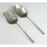 A pair of sterling silver servers with twist handles 192 grams