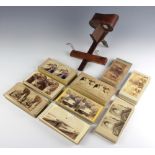 A stereoscopic viewer together with approx. 200 cards