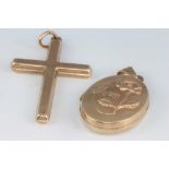 A 9ct yellow gold locket and a ditto cross 2.8 grams