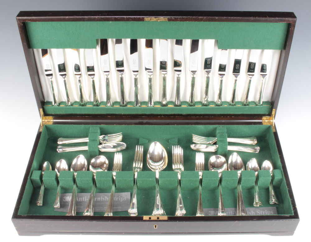 A canteen of silver plated cutlery for 8 contained in a mahogany finished canteen