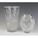 A cut glass vase decorated with flowers 16cm, a cylindrical tapered ditto 22cm
