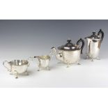 A silver 4 piece tea and coffee set with ebony mounts, Sheffield 1928/1929, gross 1558 grams
