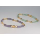 A 14ct yellow gold hardstone mounted bracelet, a ditto with matching earrings and a 9ct gold