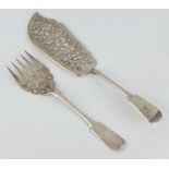 A pair of Victorian pierced silver fish servers with scroll decoration Sheffield 1860 272 grams