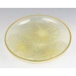 Lalique, a Volubilis opalescent glass bowl raised on 3 feet, signed R LALIQUE 21.5cm