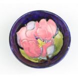 A modern Moorcroft bowl the blue ground with flowers 11cm