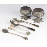 A pair of Indian repousse silver table salts and minor cutlery 299 grams