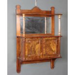 A Victorian walnut and burr walnut hanging cabinet with raised back fitted a mirror, the base